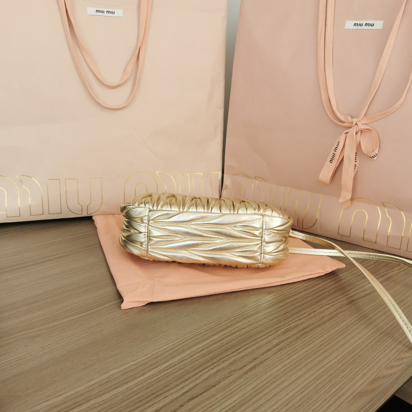 Miumiu - Wander matelassé nappa leather hobo Gold