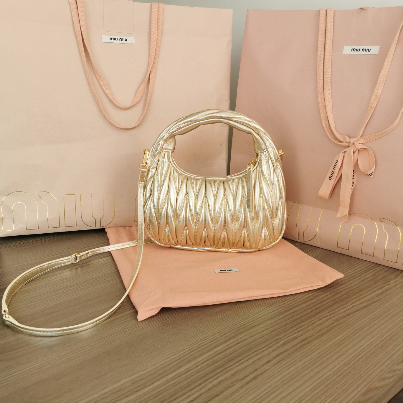 Miumiu - Wander matelassé nappa leather hobo Gold