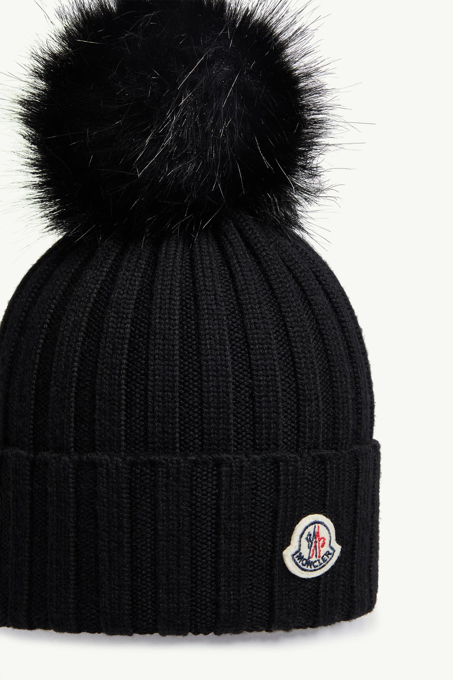 Moncler Bonnet avec pompon en Noir