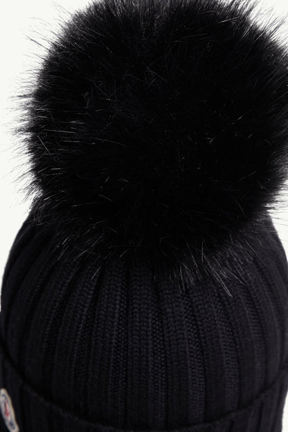 Moncler Bonnet avec pompon en Noir