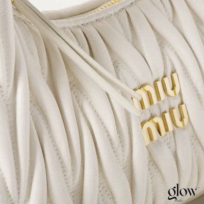 Miumiu - Wander matelassé nappa leather hobo bag White